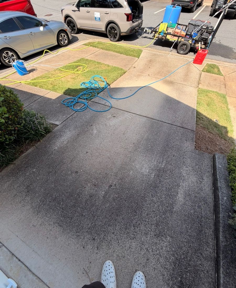 Concrete apron before cleaning